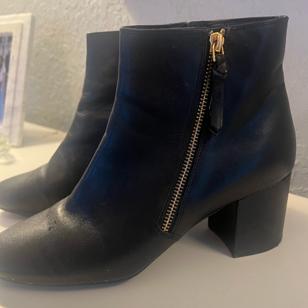 MICHAEL Michael Kors Black Ankle Boots with Gold Accent
